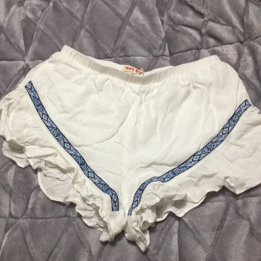 White with blue pattern shorts